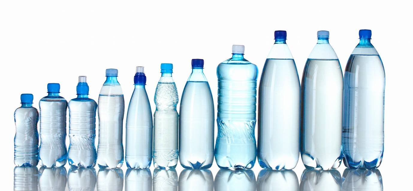A range of clear PET bottle forms in different sizes